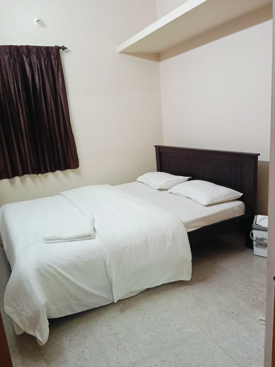 Deluxe Executive Bedroom with crisp white linen