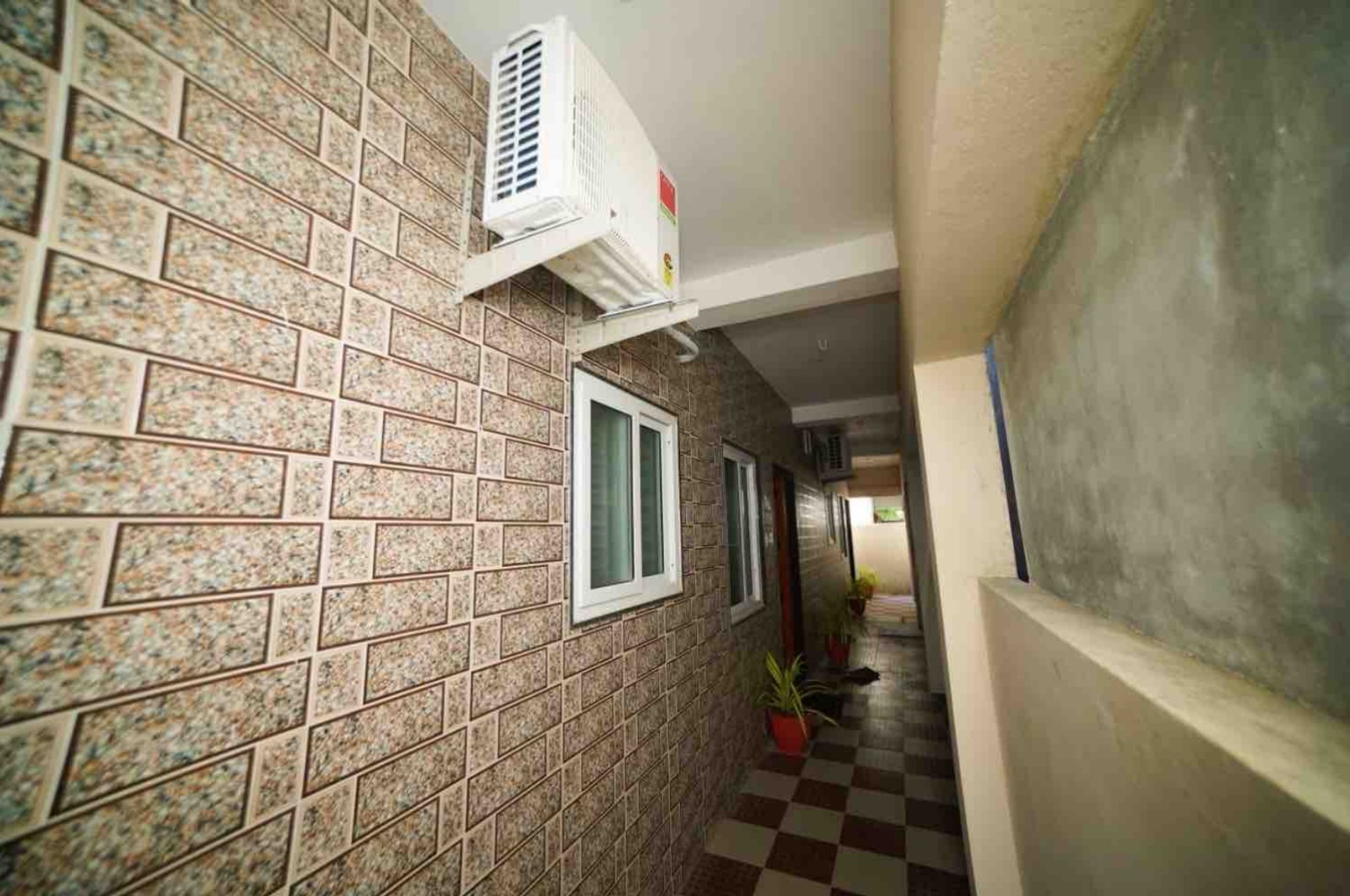 Tiled stone corridor and outdoor walkway